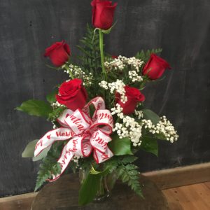 Half Dozen Roses bouquet with a ribbon
