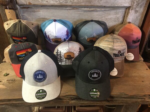 Yosemite Hats in different colors on the table